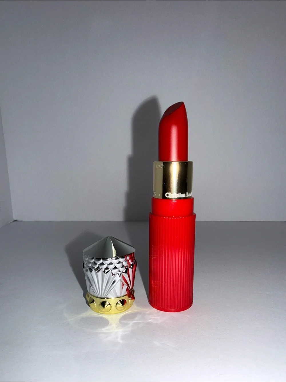 Christian Louboutin lipstick soooOO… glow on the rouge Louboutin 001G
